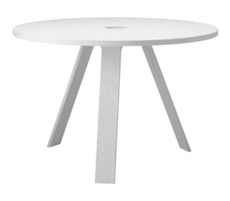 a white round table with two legs