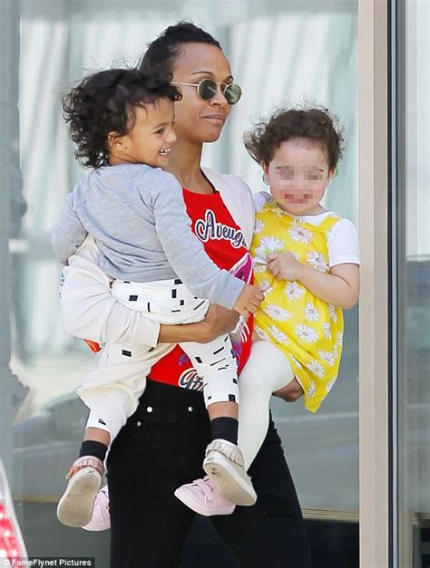 Zoe Saldana carries son and playmate during family outing | Daily Mail ...