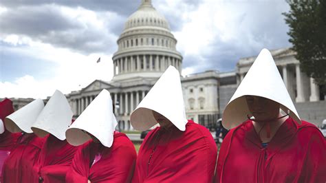 'Handmaid's Tale' Costumes Used in Protests as Symbol of Resistance ...