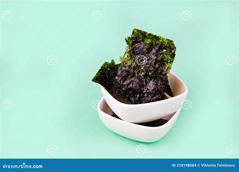 Crispy Nori Seaweed on Bowls. Traditional Japanese Dry Seaweed Sheets ...