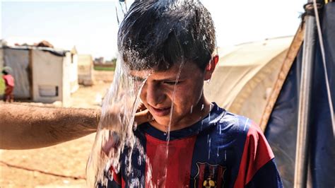 Syrians in Idlib refugee camp struggle to survive in tents as mercury ...