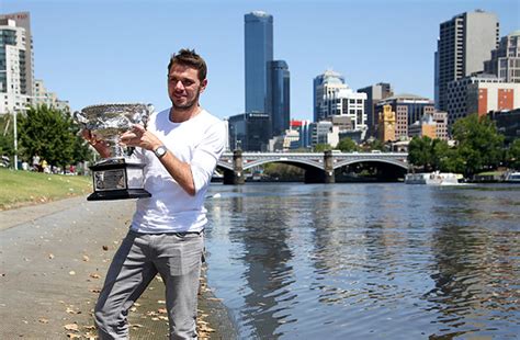 Photos: Stanislas Wawrinka shows off his new Australian Open trophy - Sports Illustrated