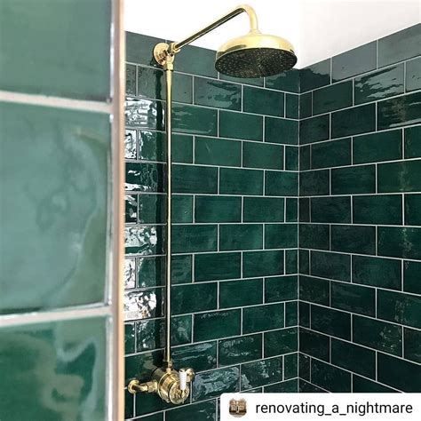 Gold shower | Mandarin stone, Dark green tile, Green shower tile