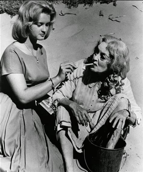 B.D. Hyman Lights Her Mother Bette Davis’ Cigarette on The Set of ‘What Ever Happened to Baby ...