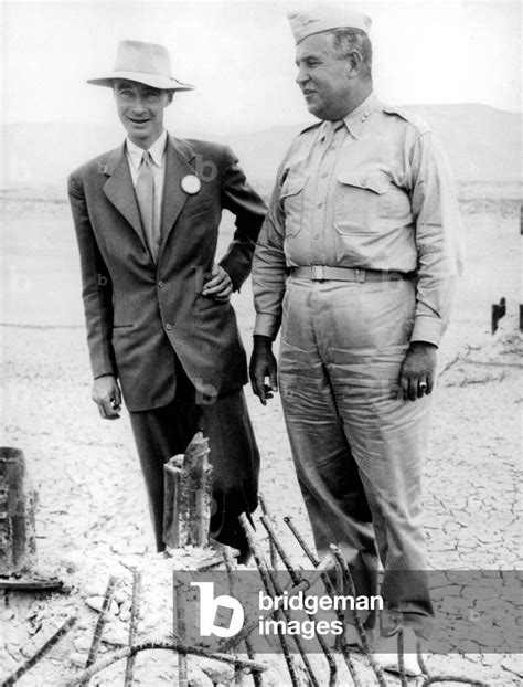 Image of Robert Oppenheimer and Major General Leslie Groves inspecting the new