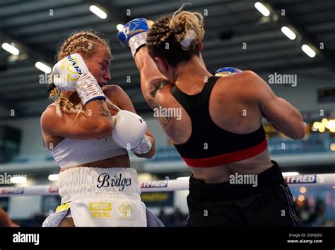 Ebanie Bridges (left) and Mailys Gangloff in their International Bantamweight contest during the ...