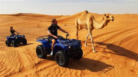 From Dubai: Morning ATV Quad Biking Desert Safari Adventure | GetYourGuide