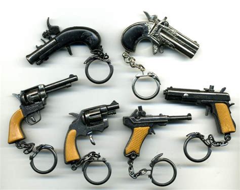 72 Wholesale Mini Gun Keychain - at - wholesalesockdeals.com