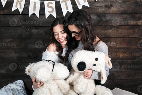 Two charming girls playing with Christmas toys 11521401 Stock Photo at ...