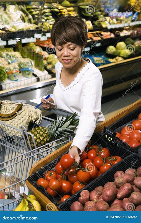 Woman grocery shopping. stock image. Image of choice, market - 3470517