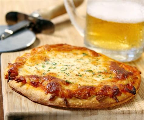 Pizza with Beer - Prepared Food Photos, Inc.