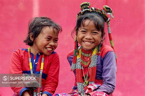 Portrait of two smiling children of the Kalagan tribe famous for Eric ...