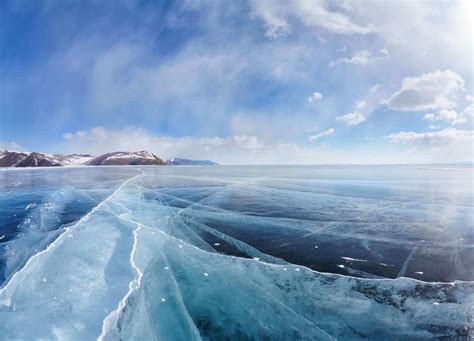 Winter ice landscape on Siberian lake Baikal with clouds | Inside Gallery