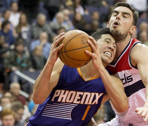 Phoenix Suns' Devin Booker out with ankle injury - UPI.com