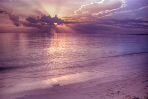 Sunset on Seven Mile Beach Photograph by Paul Huchton - Fine Art America