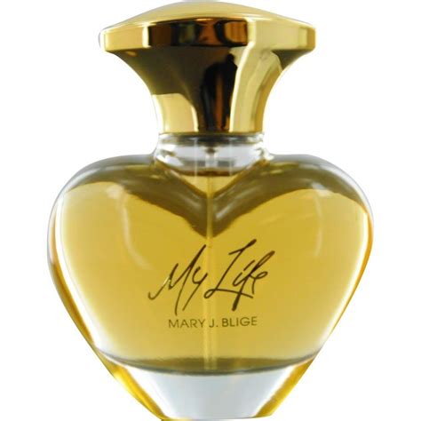 a bottle of perfume with the name mary j blige written in gold on it