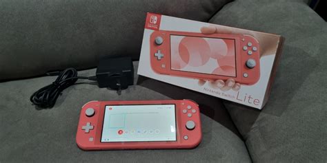 Nintendo Switch Lite Coral on Carousell