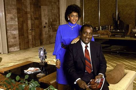 Publishing tycoon John H. Johnson and heiress daughter Linda in his office, 1980s. Founder of ...