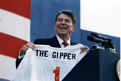 Ronald Reagan. President Reagan Holding A 'Gipper' Jersey At A Reagan-Bush Rally In New York ...