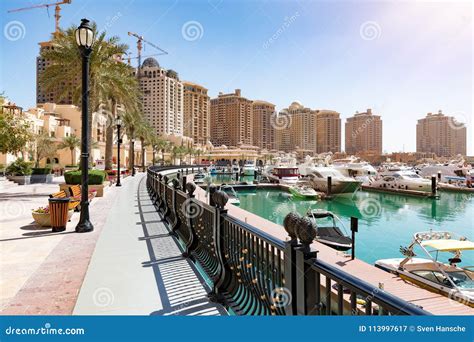 The Marina Waterfront Walkway at the Pearl in Doha, Qatar Stock Image ...