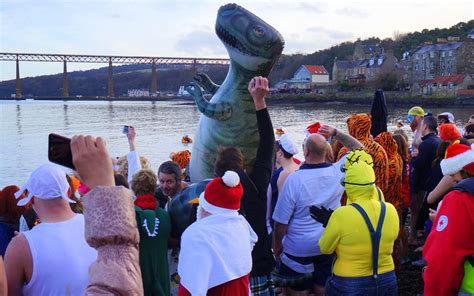 The Loony Dook: Swimmers in Costumes Brave the Firth of Forth