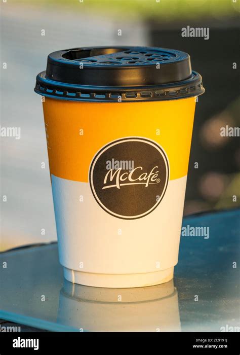 Cup of Mcdonald's McCafe Coffee, McCafe coffee is made by McDonald's, the largest fast food ...