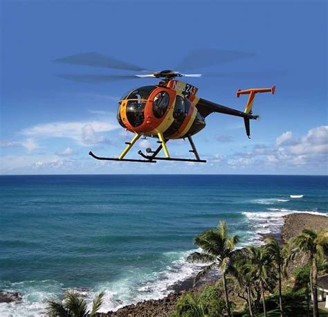 Helicopter Over Ocean with Palm Trees