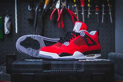 Air Jordan 4 Retro - Fire Red/Cement Grey "Toro Bravo" | Hypebeast