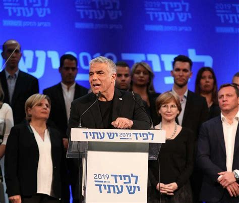 Lapid unveils Yesh Atid list, says unity with Gantz still 'on the table ...