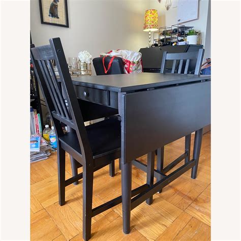 IKEA Drop-leaf Dining Table and Two Chairs - AptDeco