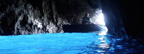 The Blue Grotto is a sea cave on the coast of the Capri Island, inside the cave, the water ...