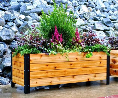 I built these simple yet beautiful modern planter boxes using Cedar ...