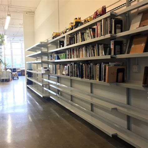 This architect's library shelving transitions from 12" depth, to 18 ...