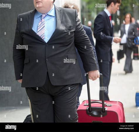 fat obese man in business suit Stock Photo: 69087448 - Alamy