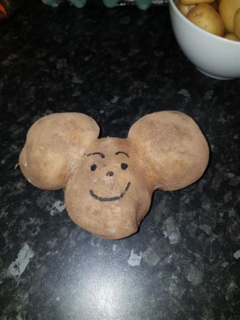 Mickey mouse looking potato my mom drew a face on : r/mildlyinteresting