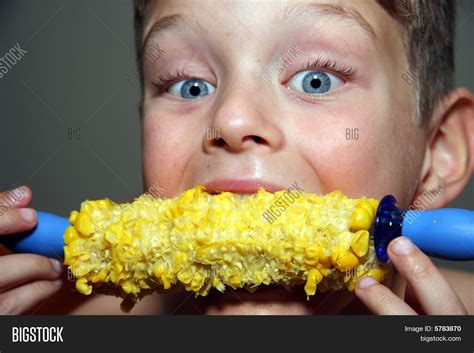 Child Eating Corn On Cob Image & Photo | Bigstock