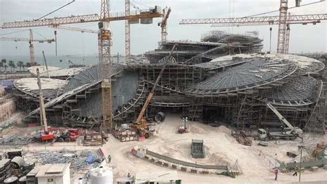 Construction of the National Museum in Doha, Qatar - Stock Video Footage - Dissolve