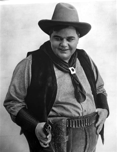 Posterazzi: Roscoe Arbuckle Posed in Cowboy Outfit Photo Print (8 x 10) | Rakuten.com