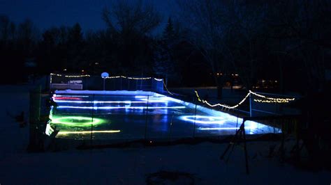 LED Lights Frozen in Backyard Ice Rink - YouTube