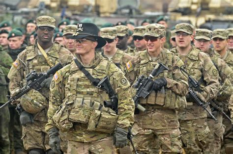 Wearing his cavalry Stetson, Capt. Michael Sims, of the 1st Squadron, 2nd Cavalry Regiment ...