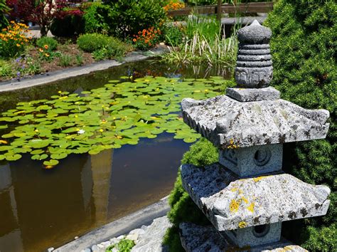 Stone lantern in the garden 1310282 Stock Photo at Vecteezy