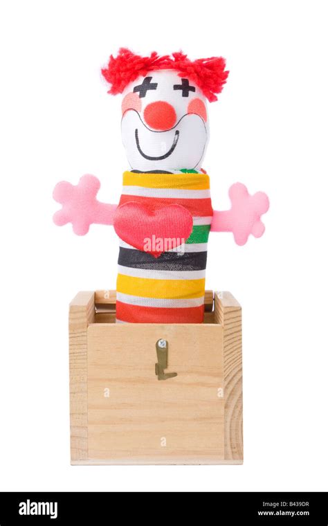 Jack-in-the-box toy isolated on a white background Stock Photo - Alamy