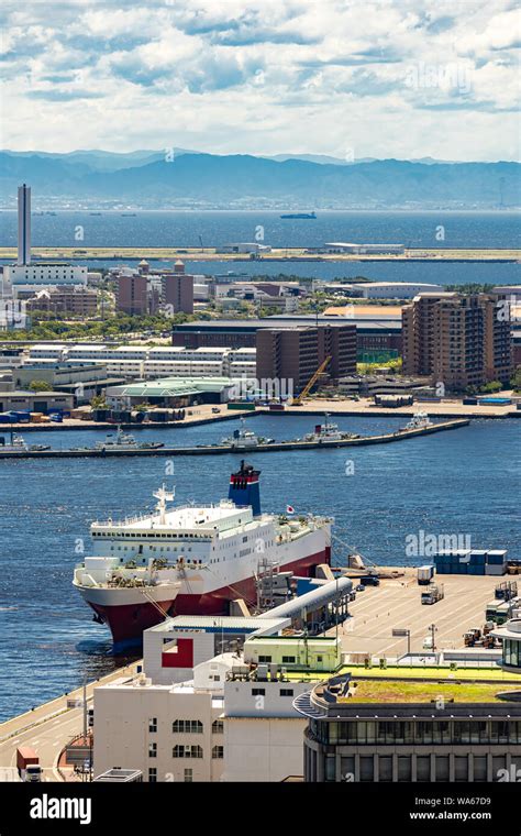 Aerial view of Tourist Cruise ship liner at Kobe port bay in downtown ...