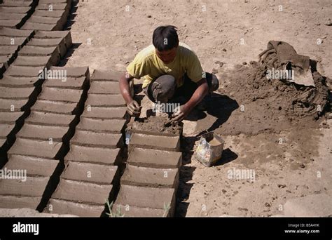 Man making mud bricks Shey Ladakh India Asia Stock Photo - Alamy