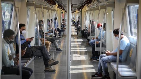 After fresh Covid-19 restrictions, Delhi Metro to run at 100% seating ...