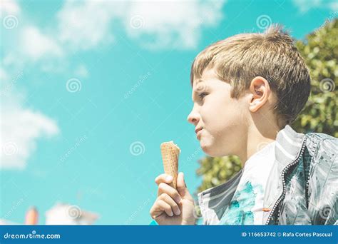 Close-up of a Child Eating an Ice Cream Cone Stock Photo - Image of child, cold: 116653742