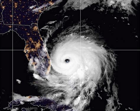 NHC says Dorian weakens to Category 2 hurricane | Reuters