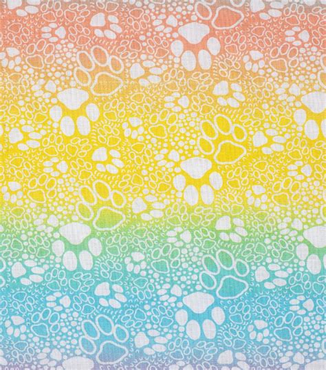 Novelty Cotton Fabric Rainbow Paw Prints | JOANN