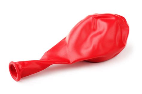 Deflated Red Rubber Balloon Stock Photo - Download Image Now - iStock