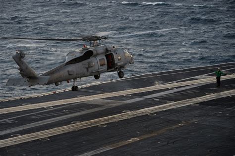 DVIDS - Images - Helicopter lands aboard USS Nimitz [Image 17 of 36]